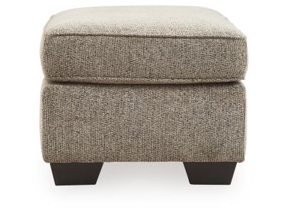 Benchcraft McCluer Mocha Ottoman in Brown - 8100314